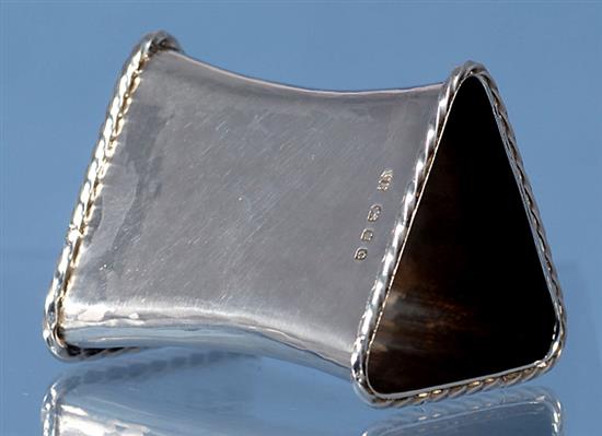 A 1930s Arts & Crafts silver waisted triangular napkin ring, by Omar Ramsden, Height 58mm weight 1.8oz/57grms